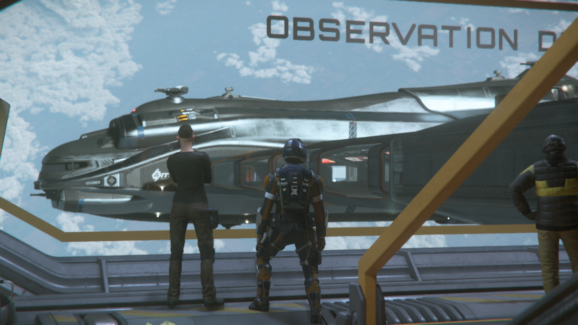 Civilians view Hull C docked from observation deck